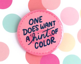 One does want a hint of color / The Birdcage quote button pin