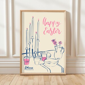 May include: A digital illustration of a table setting with candles, plates, glasses, and a jug of flowers. The text "Happy Easter" is written in pink lettering on a cream background. The artist's name, "Dina Stojanova", is written in pink lettering at the bottom of the image.