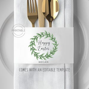 May include: A white napkin with gold cutlery and a decorative paper band. The band features a green wreath with the words "Happy Easter" and "Megan". The text "Comes with an editable template" is also visible.