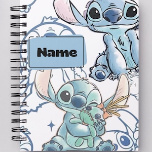 May include: Spiral-bound notebook featuring a blue and white design with the character Stitch from Lilo & Stitch. The notebook has a light blue rectangle with the word "Name" in black. The background has multiple Stitch illustrations.