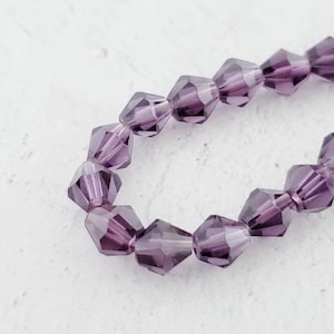 6mm Purple Glass Bicone Beads, Strand of 15&quot; Faceted Glass Bicones
