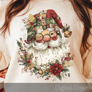 May include: A cream-colored sweatshirt featuring a whimsical Santa Claus design. Santa is depicted with a white beard, round glasses, and a patchwork hat. The design includes floral and berry accents, with the text "Digital Download" at the bottom.