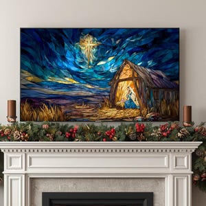 May include: A stained-glass style artwork depicting a nativity scene. The artwork features a star, a stable, and figures in blue and gold hues, set against a dark blue sky. The artwork is displayed above a fireplace decorated with a festive garland.
