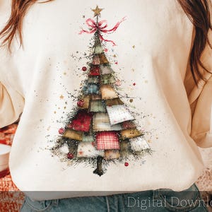 May include: Cream-colored sweatshirt featuring a watercolor Christmas tree design. The tree is composed of patchwork squares in various colors and patterns, adorned with red ornaments, a star, and a pink bow. The words "Digital Download" are at the bottom.