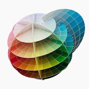 Kolormondo 3D color wheel makes science of color and color theory fun and easy. It is used in primary educatoin as well as in universities. It is used by global companies in fashion, design, architecture, print, make up, hair coloring etc. 
It is a DIY kit: You build your own world of color. The vibrant, saturated colors are positioned on the color wheel which makes up the Equator. as you move up towards the Nort pole, colors get gradually lighter. Towards the South pole the darken.