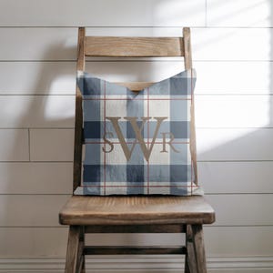 May include: A white ceramic mug with a black handle and the text "But First, Coffee" in a black, bold font. The mug is on a white surface.