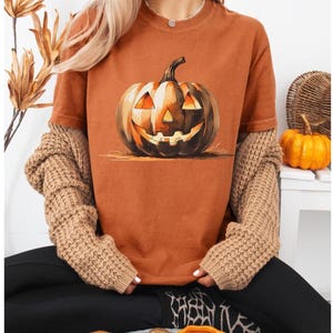 Jack-O-Lantern Halloween T-Shirt: Spooky Pumpkin Face Tee