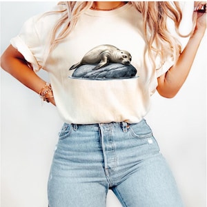 Lazy Seal Beach Unisex T-Shirt, Sleeping Animal Lover Tee, Ocean Wildlife Shirt, Coastal Summer Top, Cute Sea Life Gift