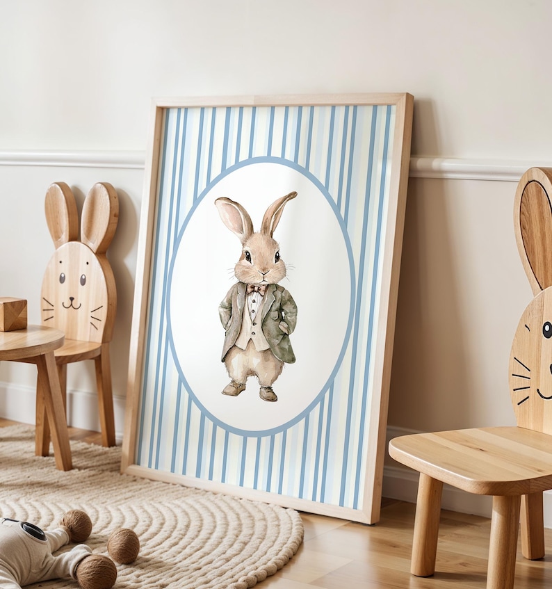 May include: A watercolor illustration of a rabbit wearing a suit and bow tie. The rabbit is in a circle on a blue and white striped background.