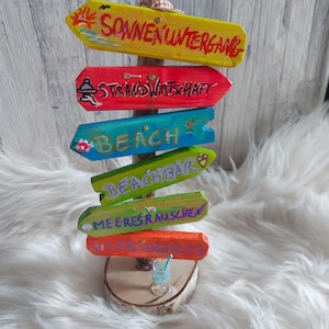 customizable signposts made of driftwood