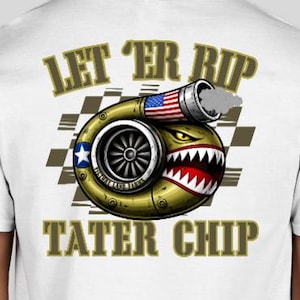 May include: White t-shirt featuring a cartoon turbocharger design with an American flag accent. The design includes the text "LET ER RIP" above and "TATER CHIP" below the turbocharger graphic. The turbocharger has a menacing shark-like mouth.