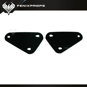 May include: Two black, irregularly shaped pieces with three holes each. The pieces are positioned side by side against a white background. The text "FENIXPROPS" is visible in the upper right corner.