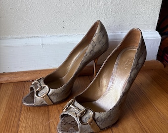 Authentic Gucci Monogrammed Pumps - size 8.5