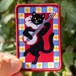 Mischievous Cat Iron-On Patch | A Vintage Jester and His Banjo