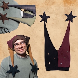 May include: A whimsical jester hat with a star design. The hat features a combination of black, burgundy, and brown panels, adorned with small buttons. The hat has long, pointed tips and star-shaped accents. The image also shows a person wearing a similar hat.