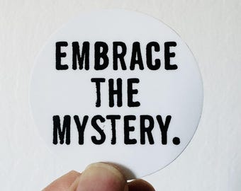 2" round vinyl sticker embrace the mystery • water bottle sticker • journal sticker