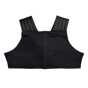 May include: A black sleeveless top with a black leather trim around the neckline. The top has a straight neckline and a cropped length.