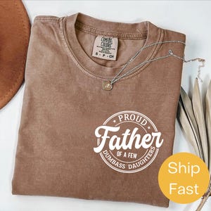 Comfort Colors® Proud Father of Dumbass Daughters Shirt, Funny Dad Shirt, Sarcastic Father’s Day Gift, Gag Gift for Dad, Humor Tee for Dads