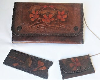 Antique Art Nouveau tooled leather clutch bag coin purse comb cover set 1900 1910 water lily pads suede interior film set prop at Lacoona