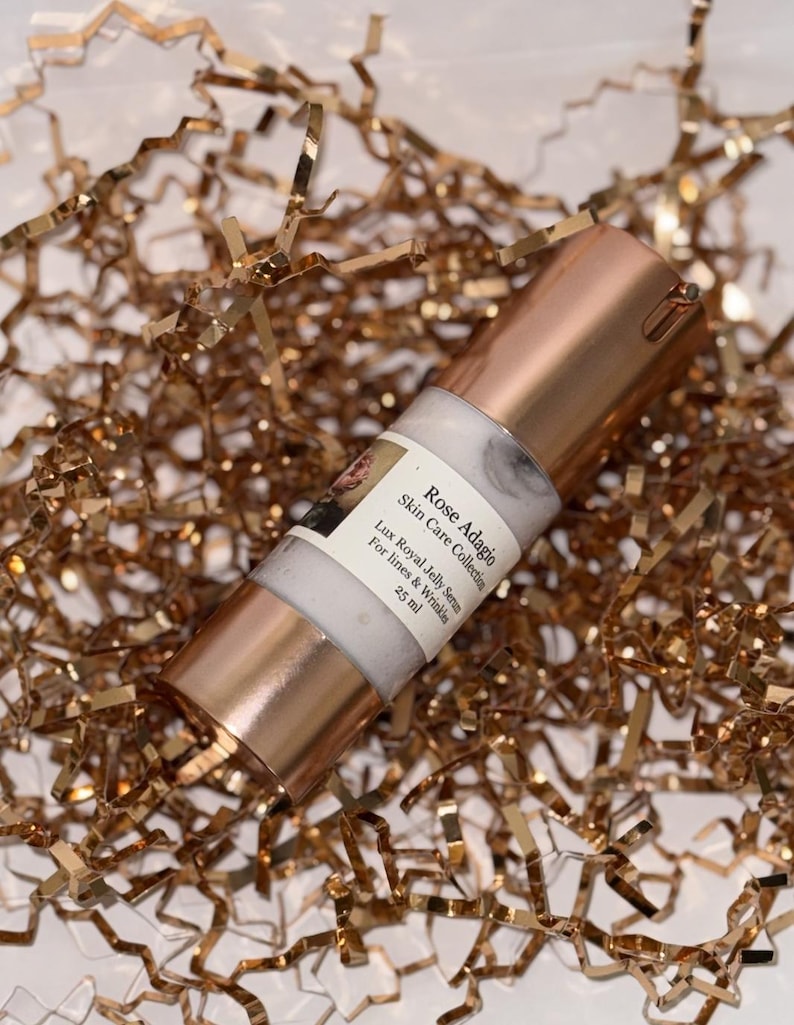 May include: A rose gold bottle of Lux Royal Jelly Serum for lines and wrinkles from the Rose Adagio Skin Care Collection. The bottle is 25 ml.