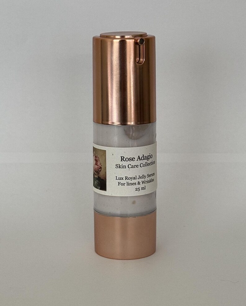May include: A rose gold bottle of Lux Royal Jelly Serum for lines and wrinkles from the Rose Adagio Skin Care Collection. The bottle contains 25 ml of serum.