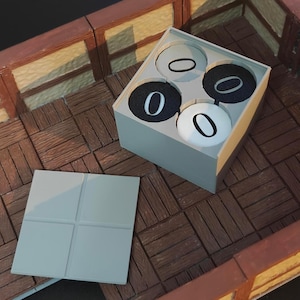 May include: A grey box containing four circular game pieces marked with the number "0". Two pieces are black with white numbers, and two are white with black numbers. A grey square tile is next to the box. The game pieces are on a wooden surface.