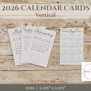 May include: A collection of 2026 calendar cards, featuring a vertical design. The cards display the months of January, February, and March, along with a full-year calendar. Each card measures 2.125" x 3.375". The cards are printed in black ink on white paper.