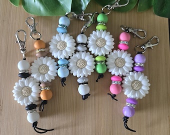 Llavero con dije de margarita de silicona – Accesorio para bolso con forma de flor y cuentas – Regalo