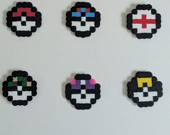 Pokemon pokeball keychains and magnets