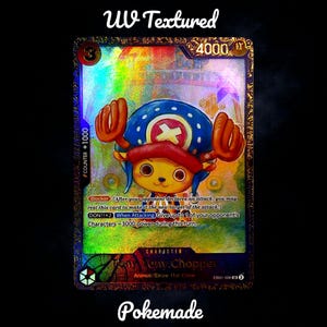 May include: A holographic trading card featuring Tony Tony Chopper from the One Piece anime. The card has a gold border and includes the text "UV Textured", "4000", and "Pokemade". Chopper is depicted with a blue hat and red antlers.