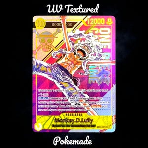 May include: A collectible trading card featuring a vibrant illustration of a character from the One Piece anime series. The card has a holographic finish with the text "ONE PIECE" and "Monkey D. Luffy". The card also has the text "UV Textured" and "Pokemade".
