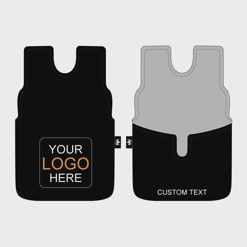 May include: Two black car seat covers with a unique shape. One features the text "YOUR LOGO HERE" in a square, while the other has "CUSTOM TEXT" at the bottom. Both have a gray interior and a small tag with a crown symbol.