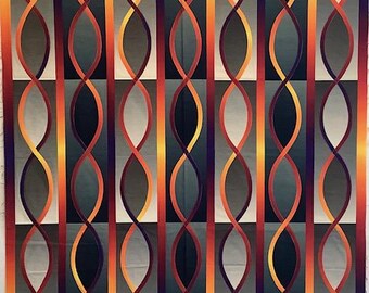 May include: A geometric pattern quilt with a repeating design of curved lines in shades of orange, yellow, red, purple, and gray.