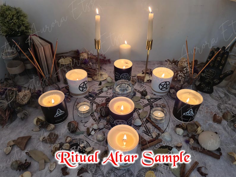 May include: A ritual altar arrangement featuring lit candles in black and white containers, decorated with pentagram and Celtic knot symbols. There are tall candles in gold holders and smaller votives. The text "Ritual Altar Sample" is visible.
