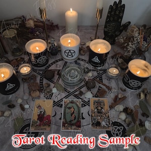 May include: A mystical arrangement with lit candles, tarot cards, and ritual objects. Candles are in black and white containers with symbols. Tarot cards are on a patterned surface. The text "Tarot Reading Sample" is at the bottom of the image.