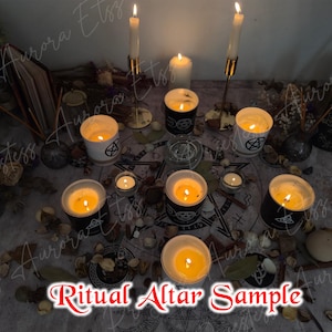 May include: A ritual altar arrangement with lit candles, including tall taper candles and votives in glass holders. The altar features a pentagram design, dried botanicals, and the text "Ritual Altar Sample".