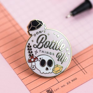 Don't Bottle Things Up Enamel Pin - Pink, Black, Gold