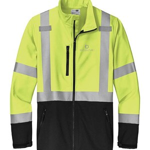May include: A high-visibility work jacket in neon yellow and black. The jacket features reflective silver stripes and panels for enhanced visibility. It has a full-length zipper, a stand-up collar, and a small logo on the chest. The jacket has two zippered pockets and adjustable cuffs.