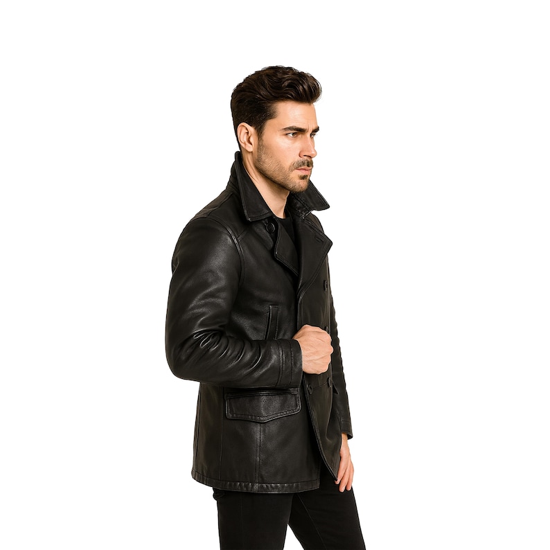 May include: A black leather jacket with a double-breasted design, featuring a notched collar and two front pockets. The jacket is worn over a black shirt and is a classic outerwear piece.