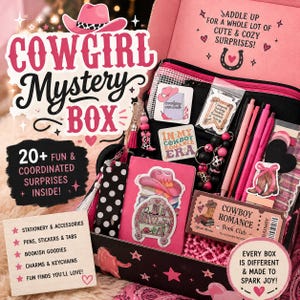 May include: A Cowgirl Mystery Box containing over 20 items including pink pens, stickers, a notebook, a keychain, and a bookmark. The box features text reading Cowgirl Mystery Box, Saddle up for a whole lot of cute and cozy surprises, and Cowboy Romance Book Club.