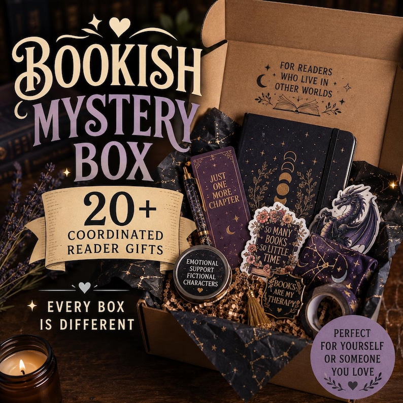 May include: A cardboard gift box containing a black journal with moon phases, a purple bookmark with the text 'JUST ONE MORE CHAPTER', a round tin labeled 'EMOTIONAL SUPPORT FICTIONAL CHARACTERS', stickers, a tassel, and a roll of patterned tape.