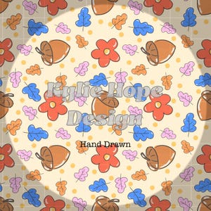 May include: A repeating pattern featuring cartoon acorns, flowers, and leaves in orange, blue, pink, and yellow. The design includes the text "Kylie Hope Design" and "Hand Drawn". The background is a light beige colour with yellow polka dots.