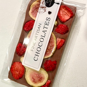 Milk chocolate bar with fruits 80g, homemade chocolate bar with strawberry and figs .