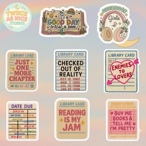 May include: A collection of colorful stickers with book-themed designs. The stickers include phrases like "It's a good day to read a book," "Just one more chapter," and "Reading is my jam." Other stickers feature library card designs.