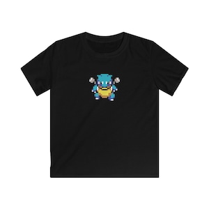 May include: Black t-shirt featuring a pixelated blue and yellow cartoon character on the front.