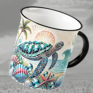 May include: White ceramic mug with a black handle and rim, featuring a colorful sea turtle design. The design includes a palm tree, seashells, a starfish, and a rising sun. The mug has a capacity of approximately 12 ounces.