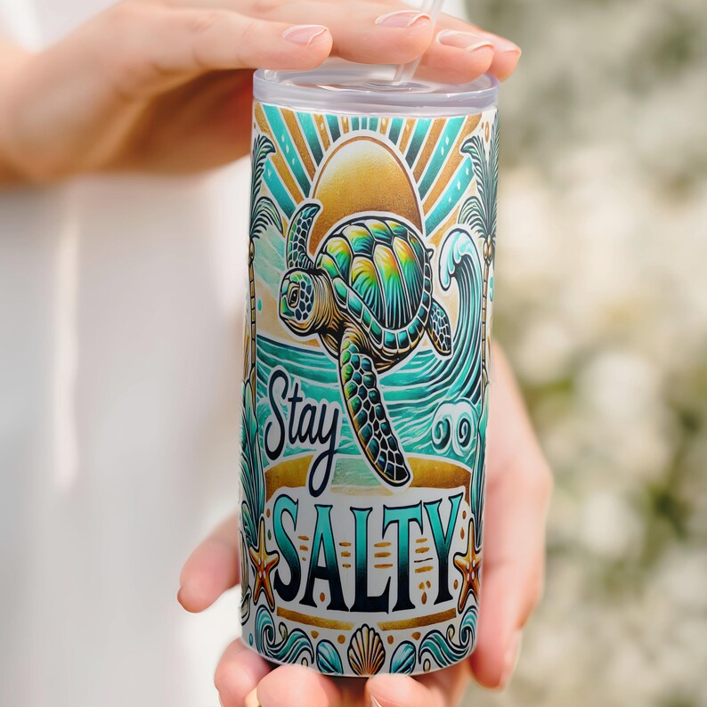 Ride the waves and stay salty with this tropical beach tumbler wrap! Featuring a vibrant sea turtle, golden sunset, palm trees, ocean waves, seashells, and starfish. Designed for 20 oz skinny tumblers, this high-quality PNG brings bold coastal vibes to your sublimation projects.