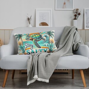 Tropical sea turtle tumbler wrap featuring a colorful turtle, sunset, palm trees, ocean waves, seashells, and "Stay Salty" text in a vibrant coastal design. Designed for 20 oz skinny tumbler sublimation