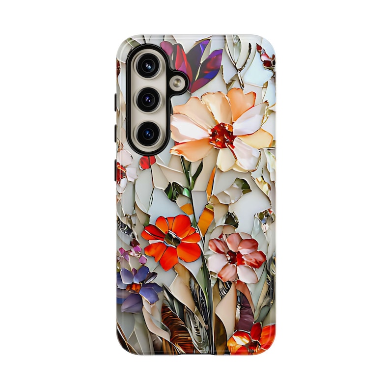 May include: A phone case with a colorful floral design. The flowers are made of different colored pieces of glass, creating a mosaic effect. The case is white with a camera cutout.