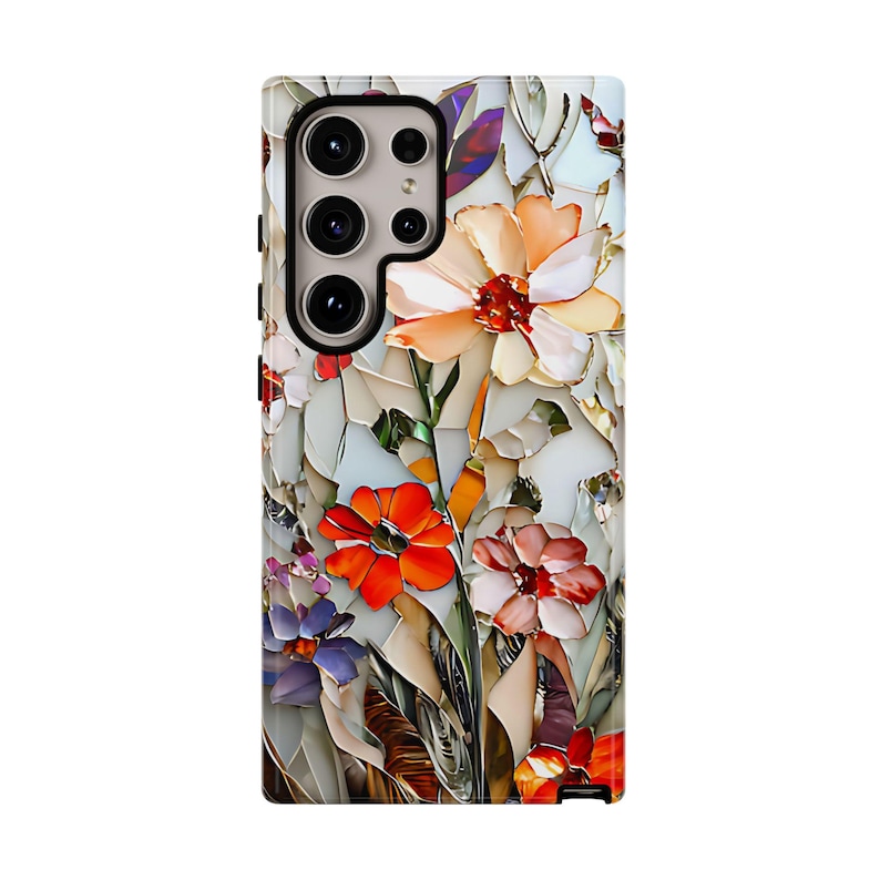 May include: A phone case with a colorful floral design. The flowers are in shades of orange, red, pink, and white. The background is a light gray with a mosaic pattern.